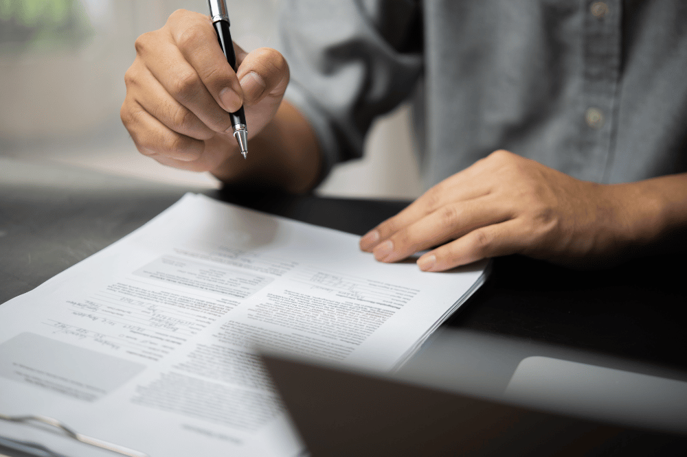 Employee signing on an employment contract
